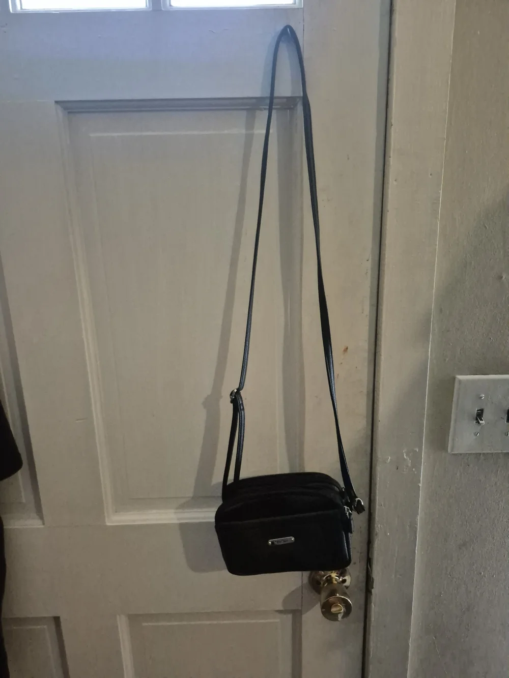 MultiSac Black Leather Crossbody Bag - Polished Logo Accent